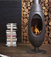 Печь-камин Invicta OVE стальная в интерьере Амазонка бай фото в Минске