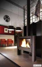 Печь-камин Invicta Antaya в интерьере чугунная Амазонка бай фото в Минске