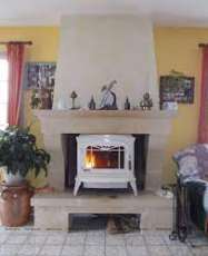 Печь-камин чугунный Invicta Bradford в интерьере Амазонка бай фото в Минске