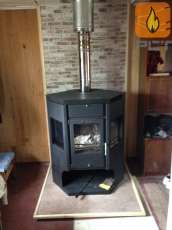 Отопительная печь-камин Сибирь 15 фото в интерьере в Минске