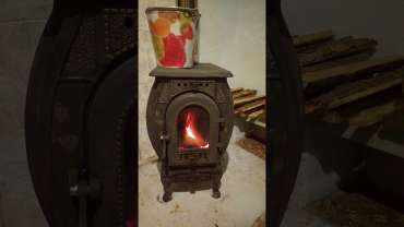 Печь отопительно-варочная чугунная "Сибирь" фото в интерьере в Минске