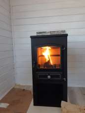 Стальной печь-камин со стеклом ЭТНА (БКД) с плитой фото в Минске