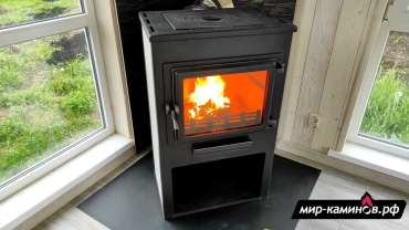 Недорогая печь-камин ЭТНА (Панорама) с плитой и теплообменником Амазонка бай фото в Минске