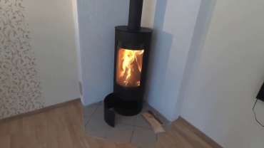 Стильная печь-камин с шамотом Мета-Бел Селигер в Минске фото в интерьере в Минске