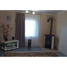 Стальной камин с шамотом Мета-Бел Ритм L фото в интерьере в Минске