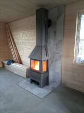 Недорогой камин Бавария со стеклами графит фото в интерьере в Минске