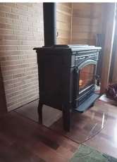 Печь-камин чугунный FireWay Gunter в интерьере чёрный Амазонка бай фото в Минске