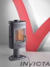 Печь-камин чугунный Invicta Mesnil в интерьере Амазонка бай фото в Минске