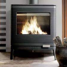 Печь-камин чугунный Invicta Kazan в интерьере Амазонка бай фото в Минске