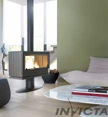 Купить Печь-камин Invicta Nelson в интерьере чугунная в Минске в Минске