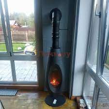 Печь-камин чугунный Invicta OVATIO в интерьере Амазонка бай фото в Минске